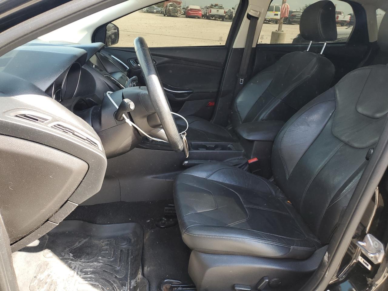 2015 Ford Focus Titanium VIN: 1FADP3J20FL260717 Lot: 81869835