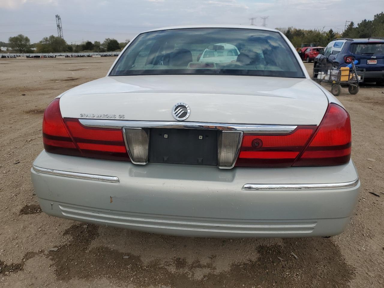 2003 Mercury Grand Marquis Gs VIN: 2MEFM74W43X692628 Lot: 87106895