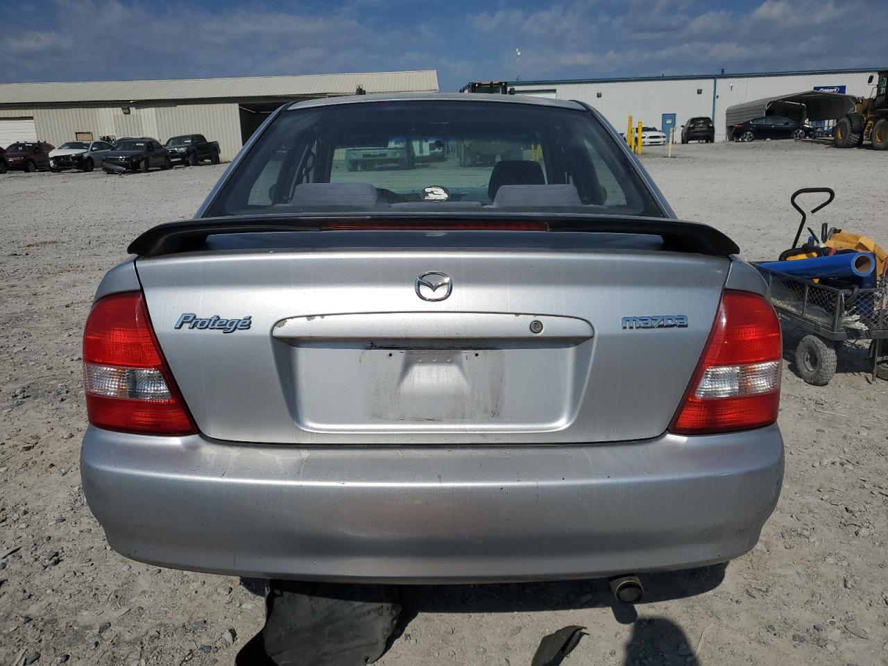 2002 Mazda Protege VIN: JM1BJ225721584923 Lot: 82630595
