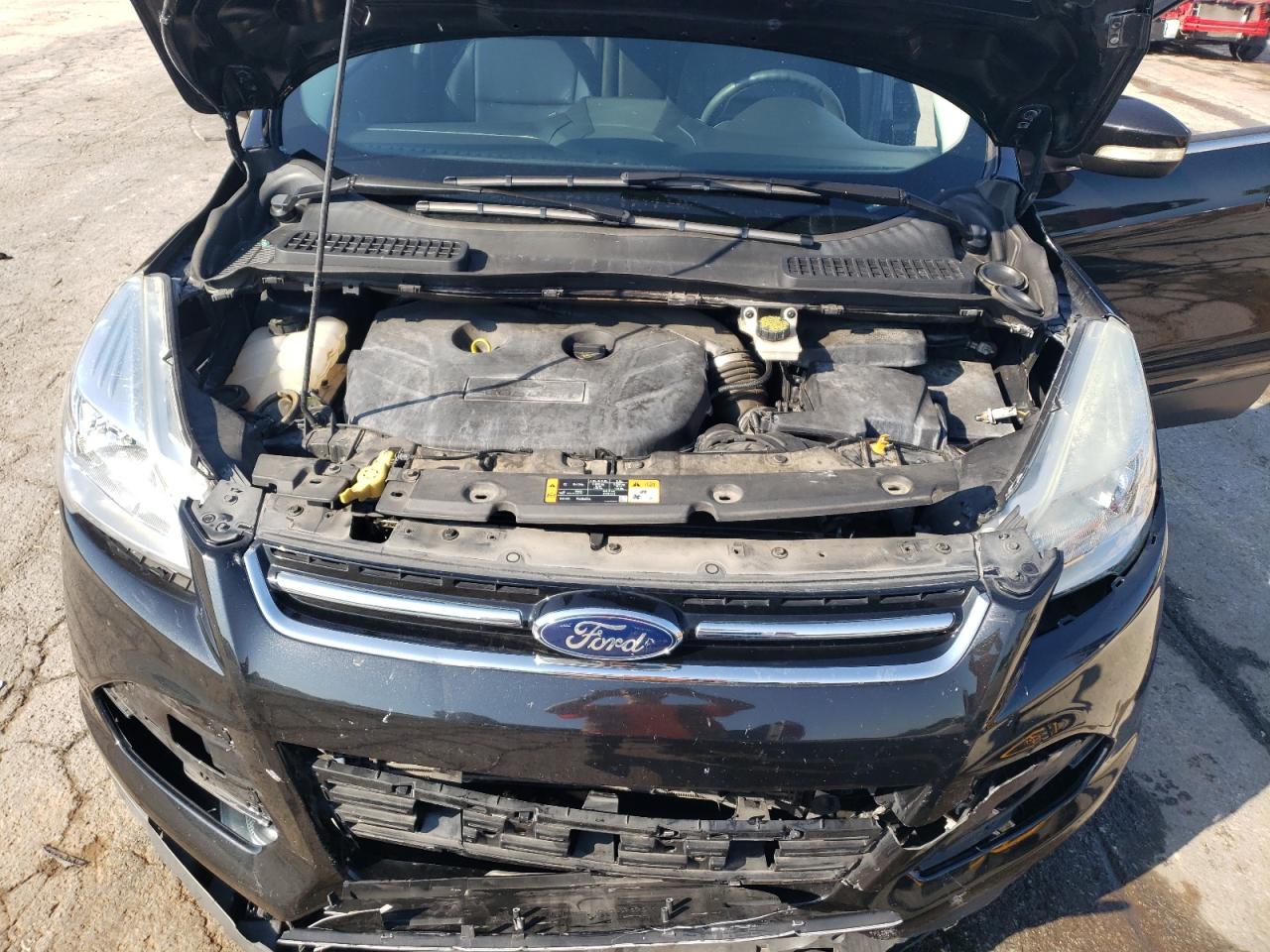 2015 Ford Escape Titanium VIN: 1FMCU0J91FUB11409 Lot: 84540405