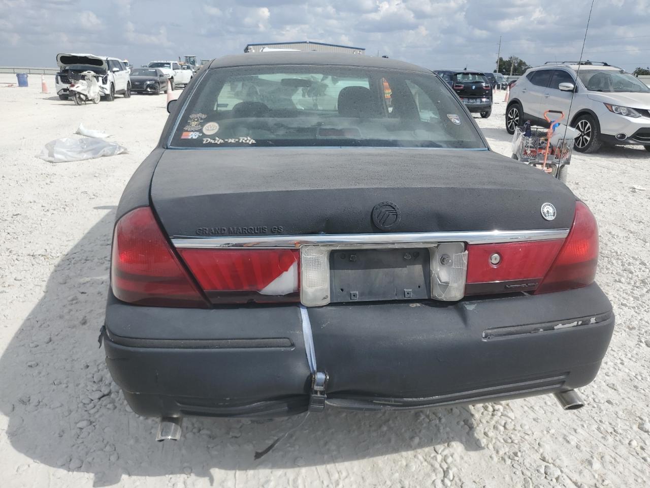 2005 Mercury Grand Marquis Gs VIN: 2MEFM74W65X668740 Lot: 90009965