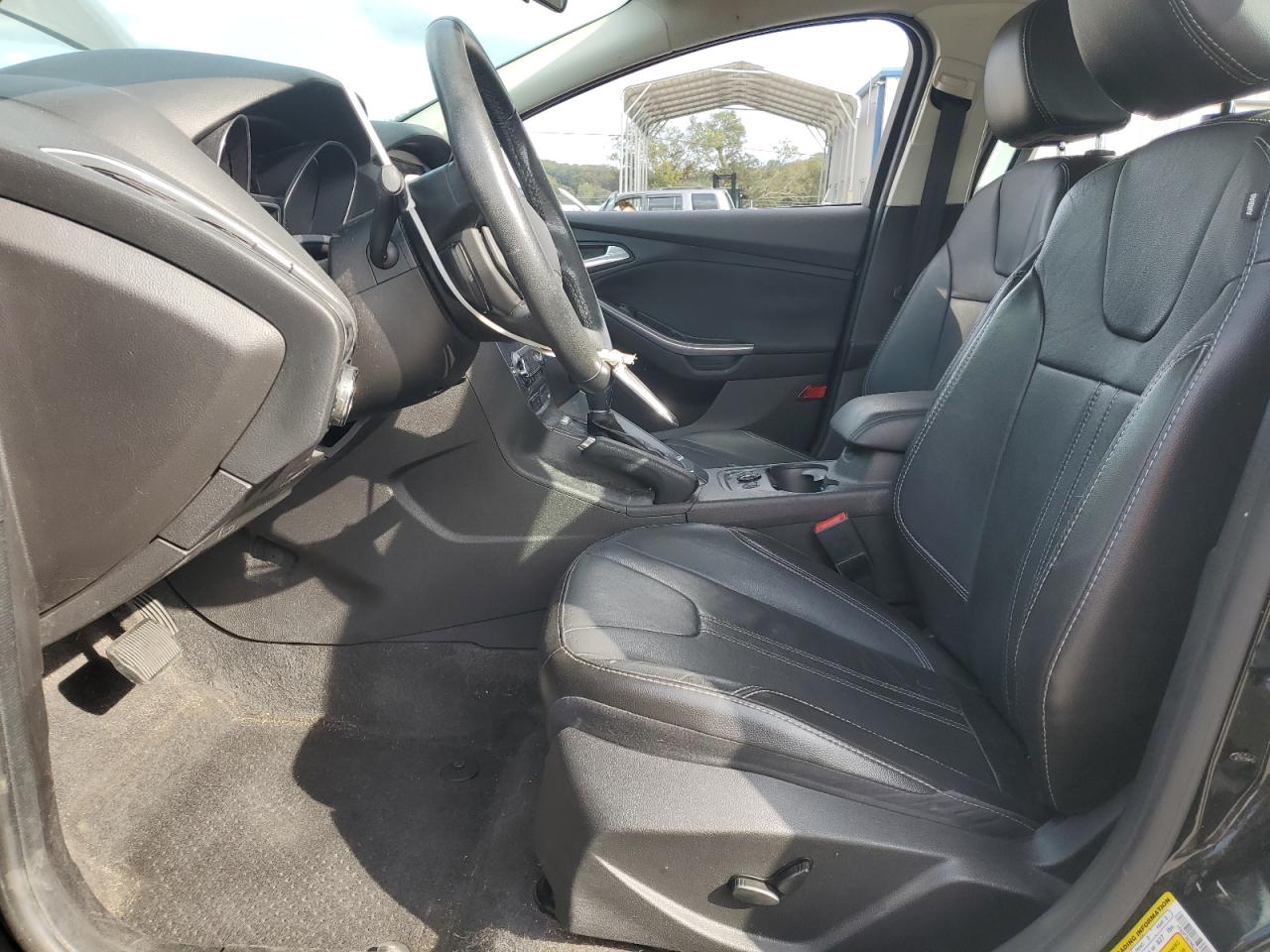 2014 Ford Focus Titanium VIN: 1FADP3N29EL357097 Lot: 86432545