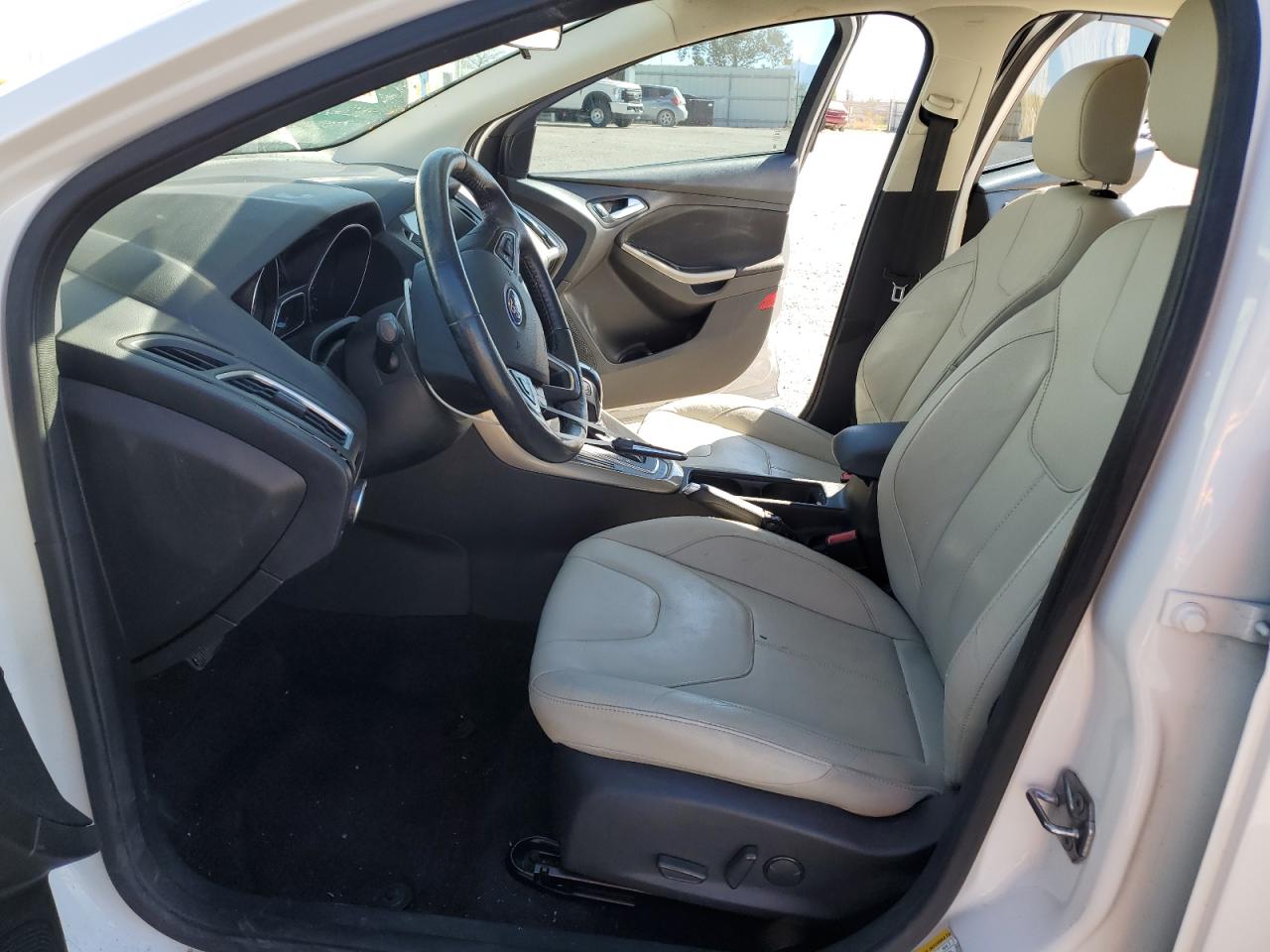 2016 Ford Focus Titanium VIN: 1FADP3J21GL230515 Lot: 85524355