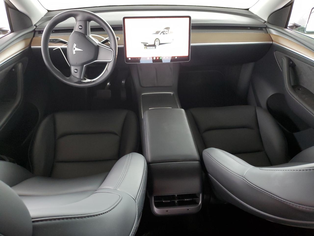 2023 Tesla Model Y VIN: 7SAYGDEEXPF619004 Lot: 82670485