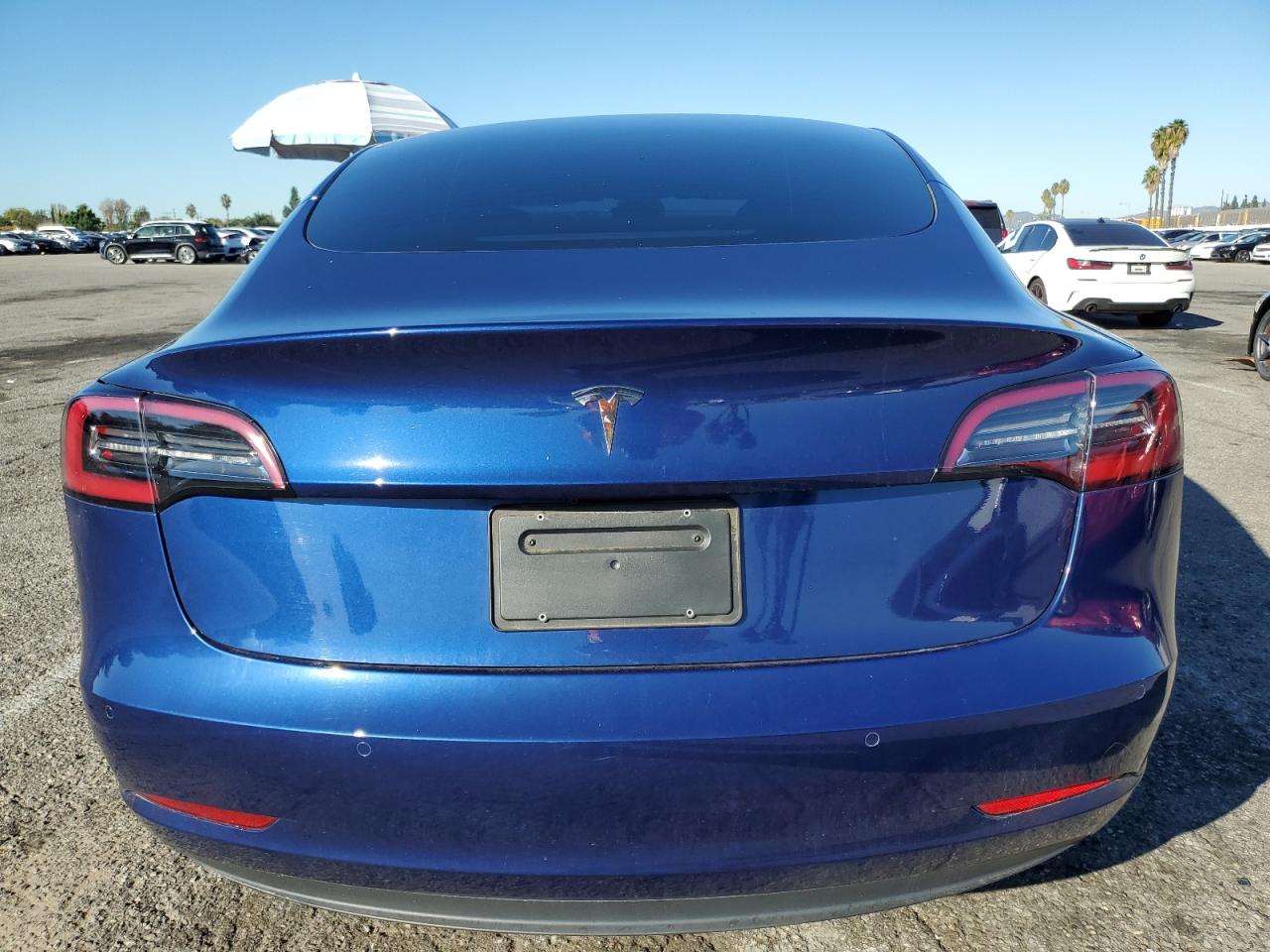 2022 Tesla Model 3 VIN: 5YJ3E1EAXNF358057 Lot: 90655875