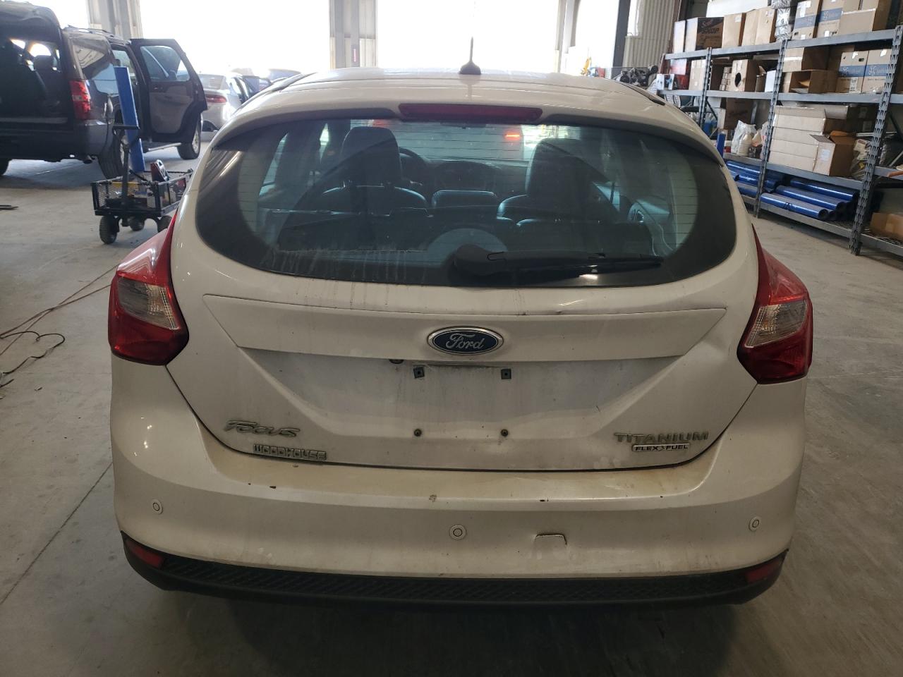 2014 Ford Focus Titanium VIN: 1FADP3N26EL387948 Lot: 84660025