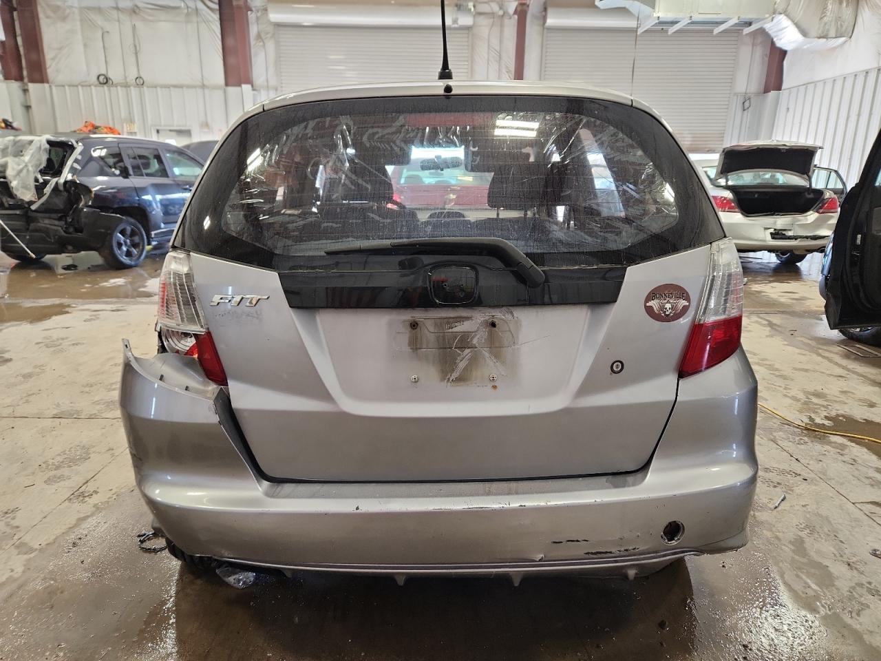 2009 Honda Fit VIN: JHMGE88219S050653 Lot: 89481325