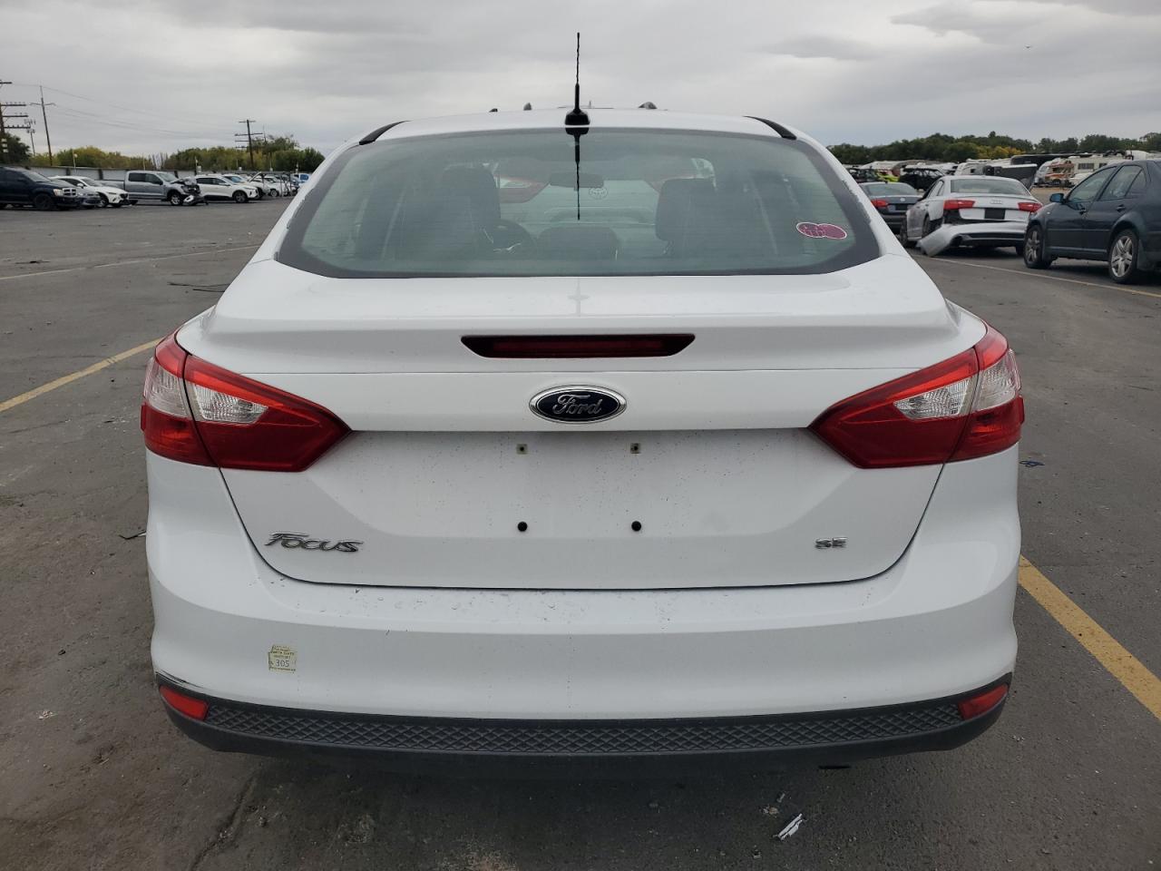 2012 Ford Focus Se VIN: 1FAHP3F27CL212055 Lot: 84980335