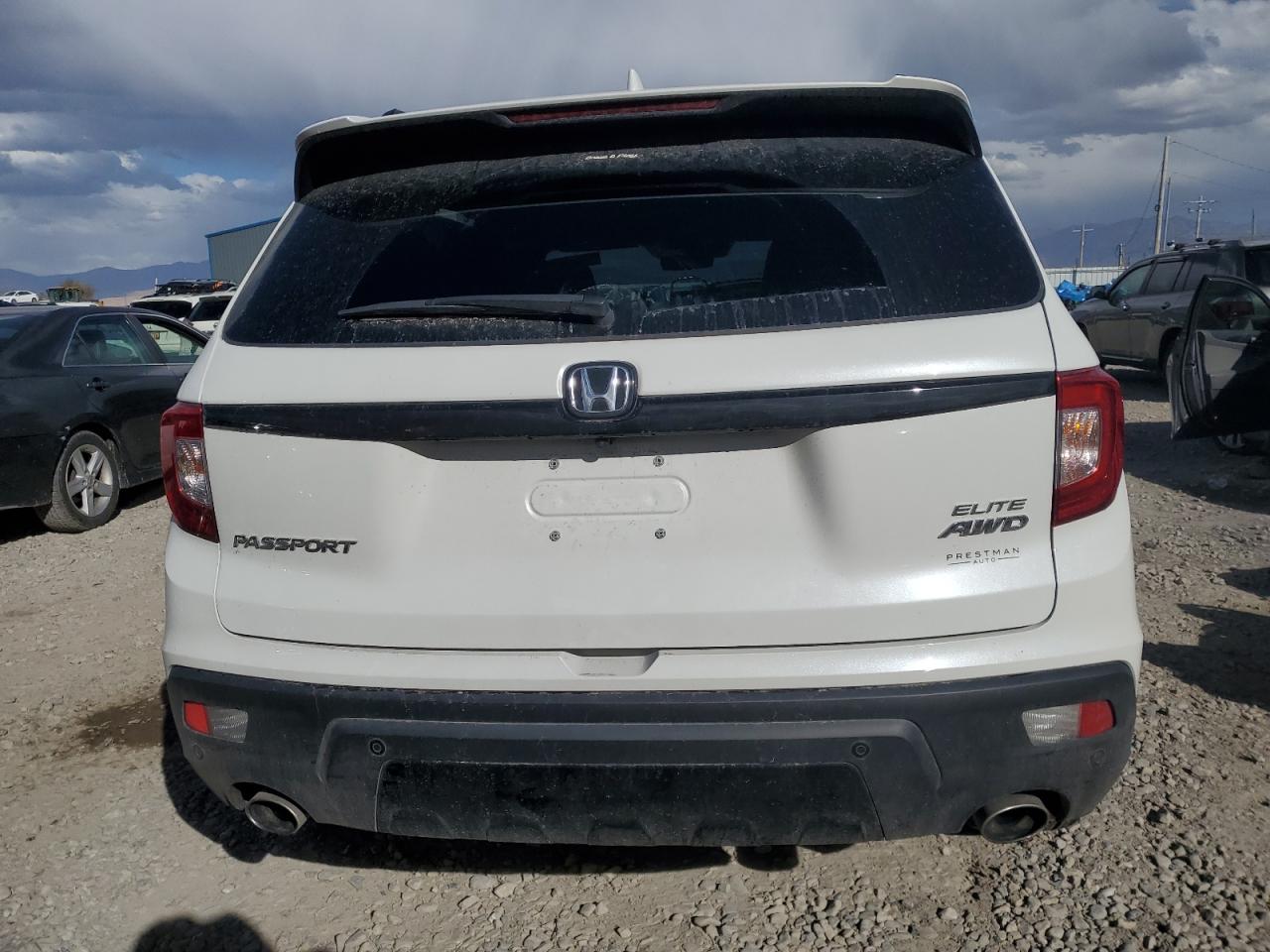2021 Honda Passport Elite VIN: 5FNYF8H02MB039538 Lot: 82199595