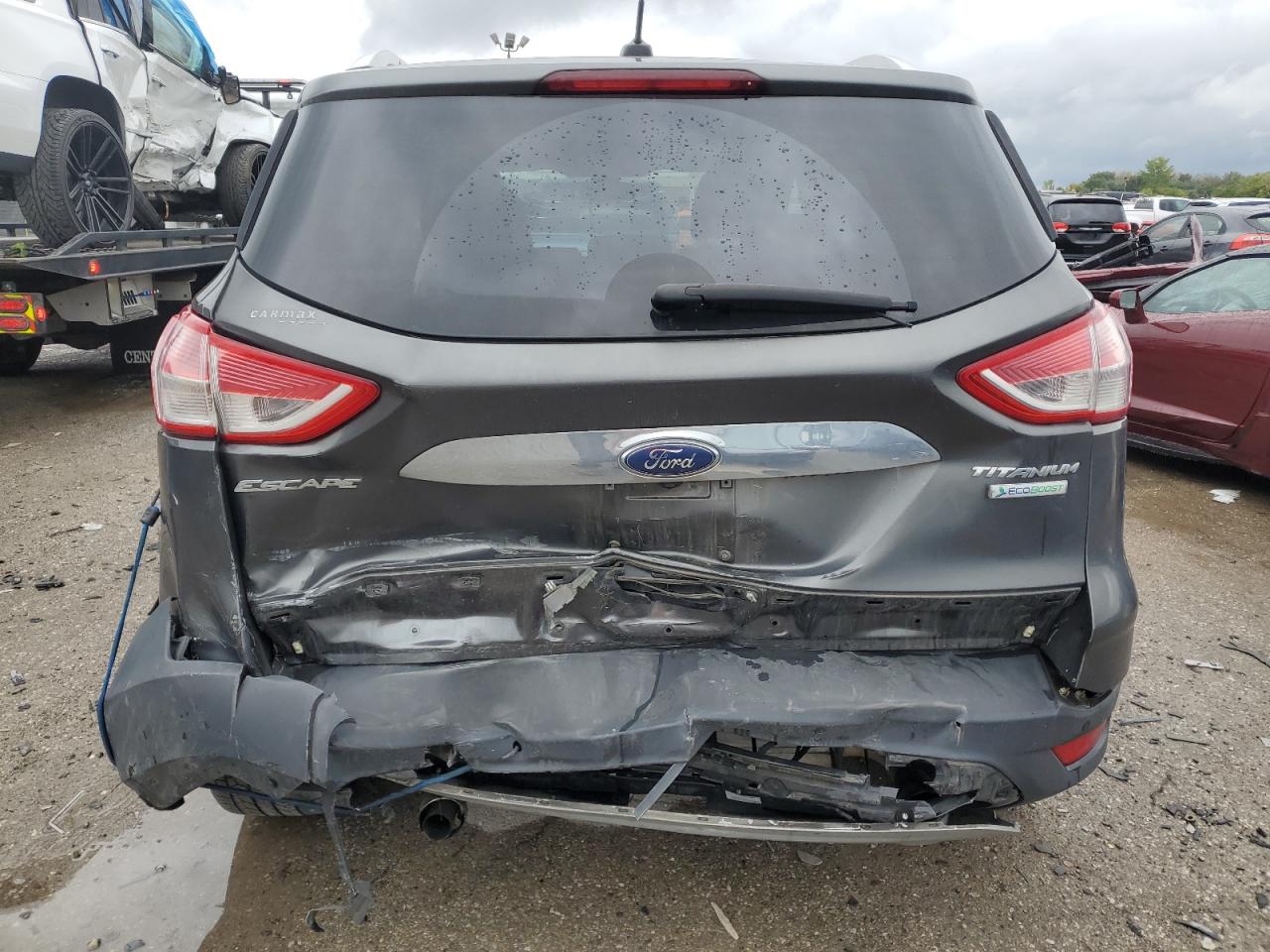 2016 Ford Escape Titanium VIN: 1FMCU0J91GUB06275 Lot: 85328095