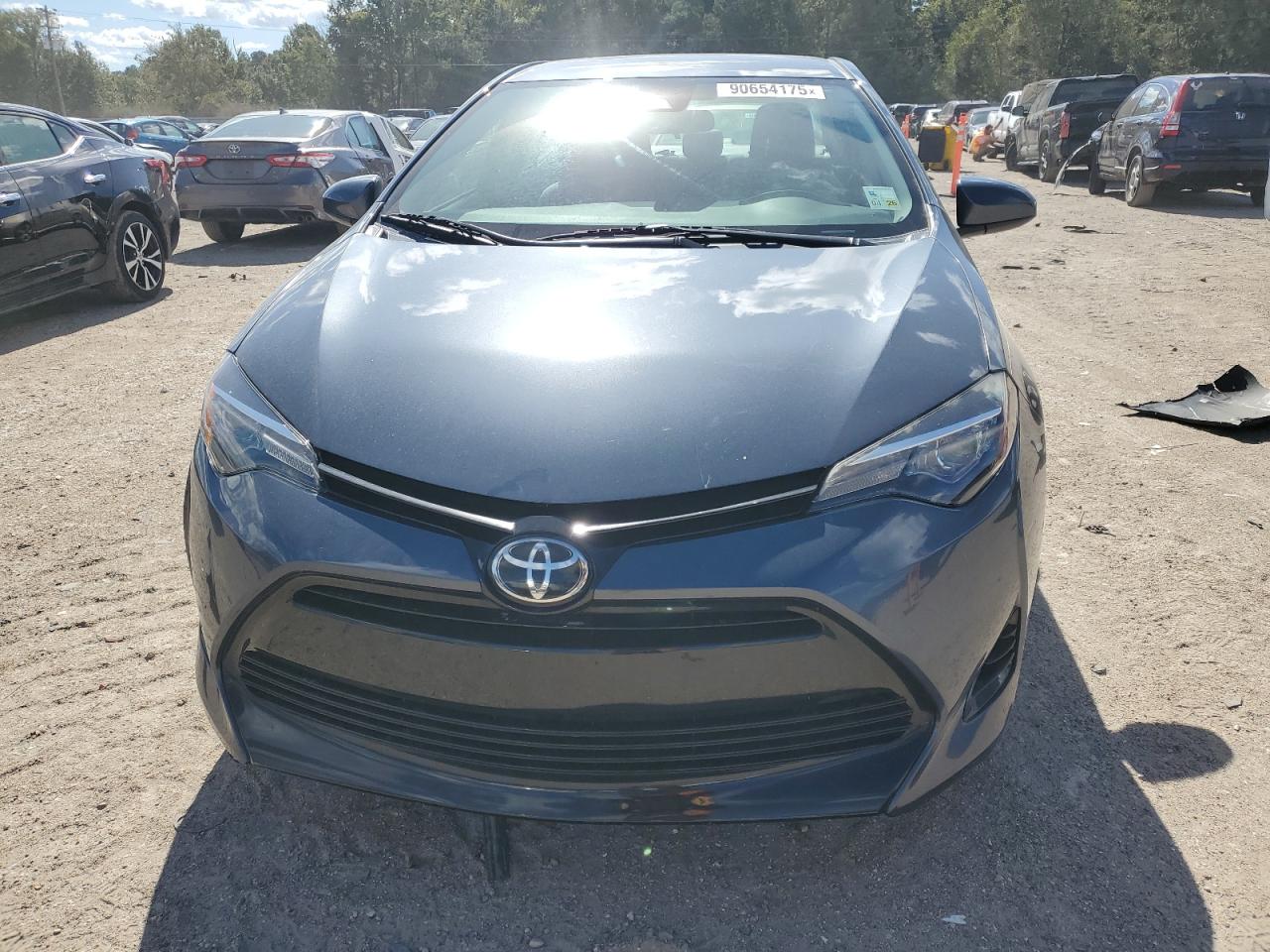 2018 Toyota Corolla L VIN: 5YFBURHE7JP810475 Lot: 90654175