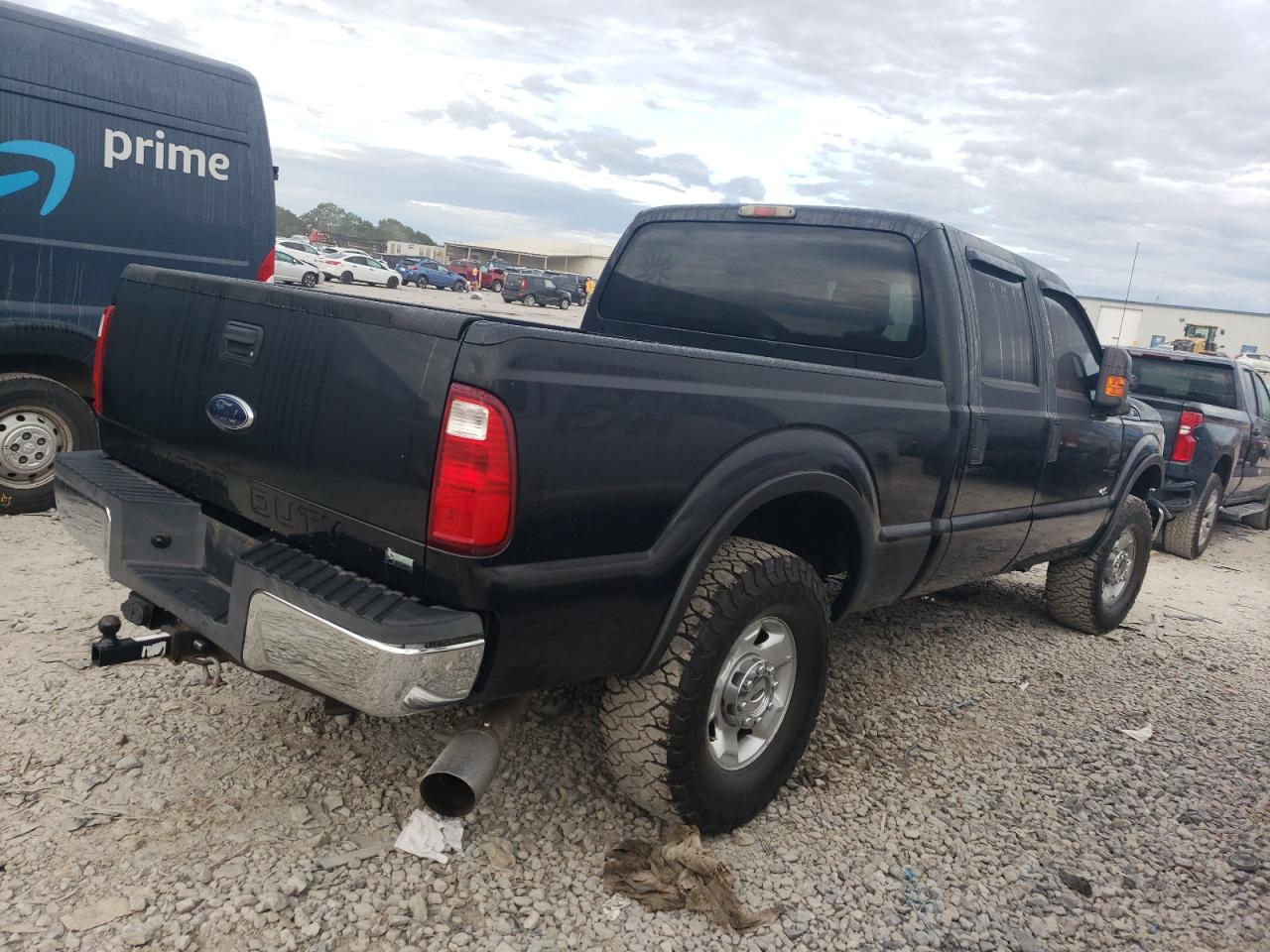 2011 Ford F250 Super Duty black null gasoline 1FT7W2B6XBEA16741 photo #4