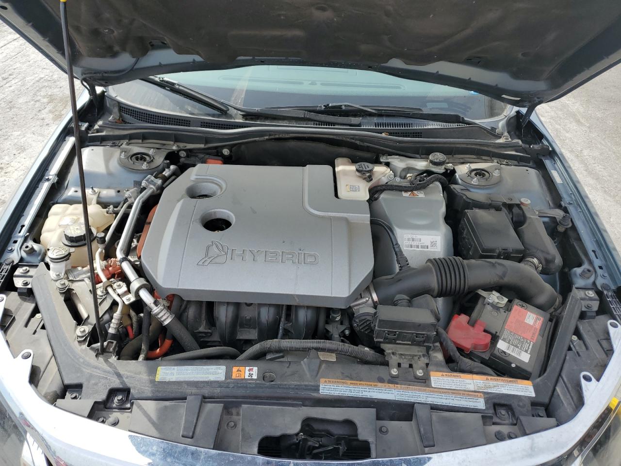 2012 Ford Fusion Hybrid VIN: 3FADP0L37CR310157 Lot: 82410355