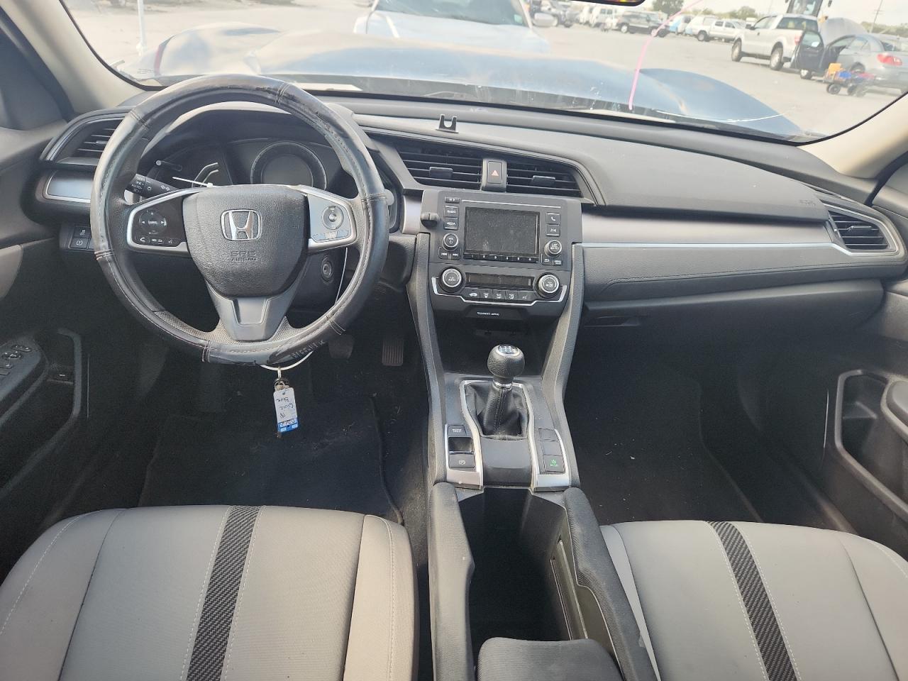 2018 Honda Civic Lx VIN: 19XFC2E57JE011216 Lot: 86103875