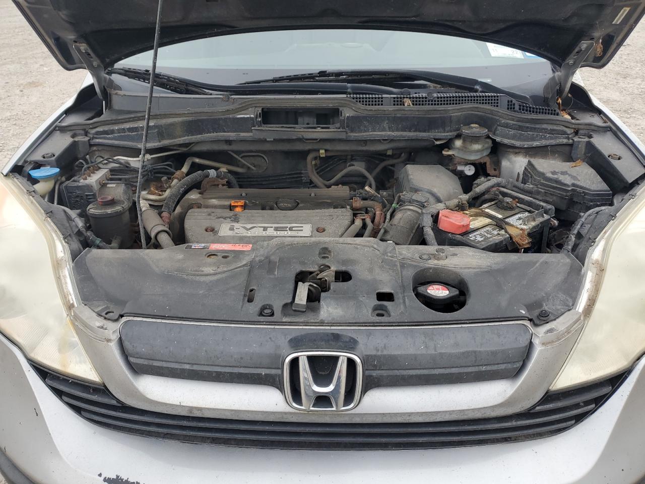 2007 Honda Cr-V Lx VIN: JHLRE48397C113424 Lot: 82523975