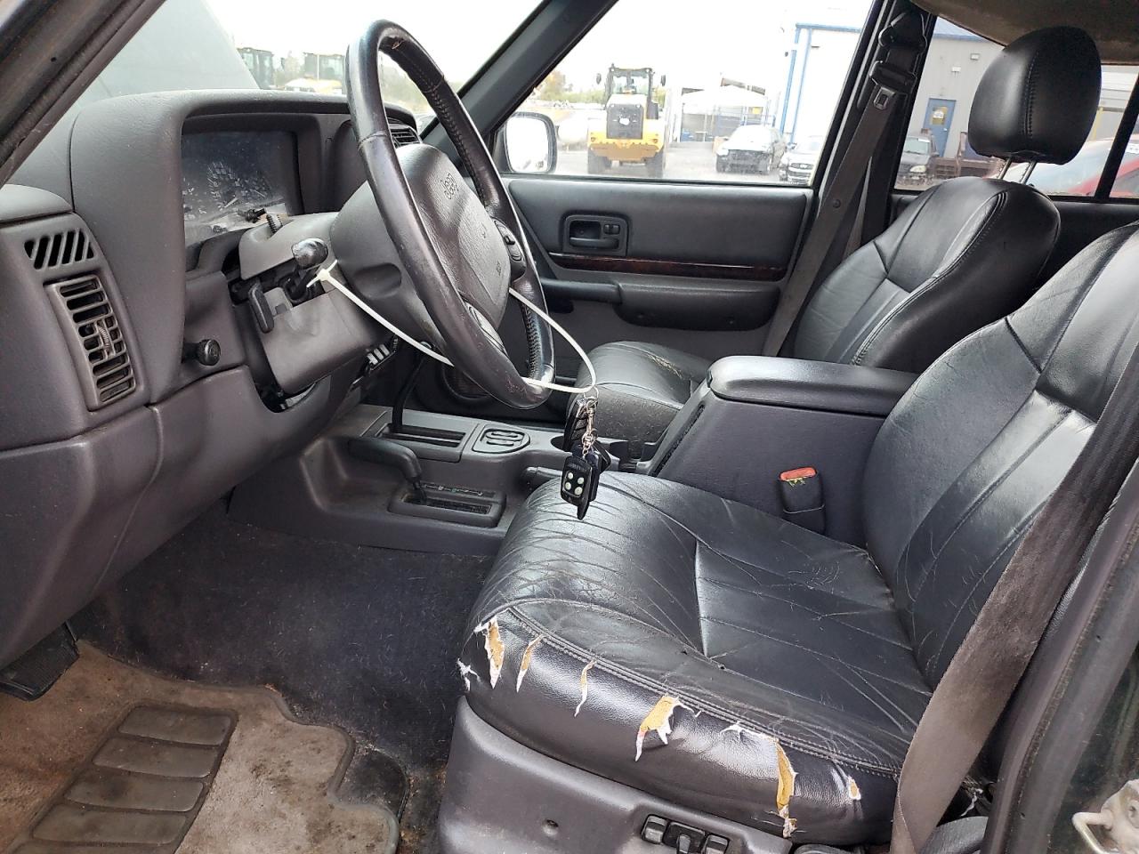 1999 Jeep Cherokee Limited VIN: 1J4FF78S5XL528238 Lot: 90693785