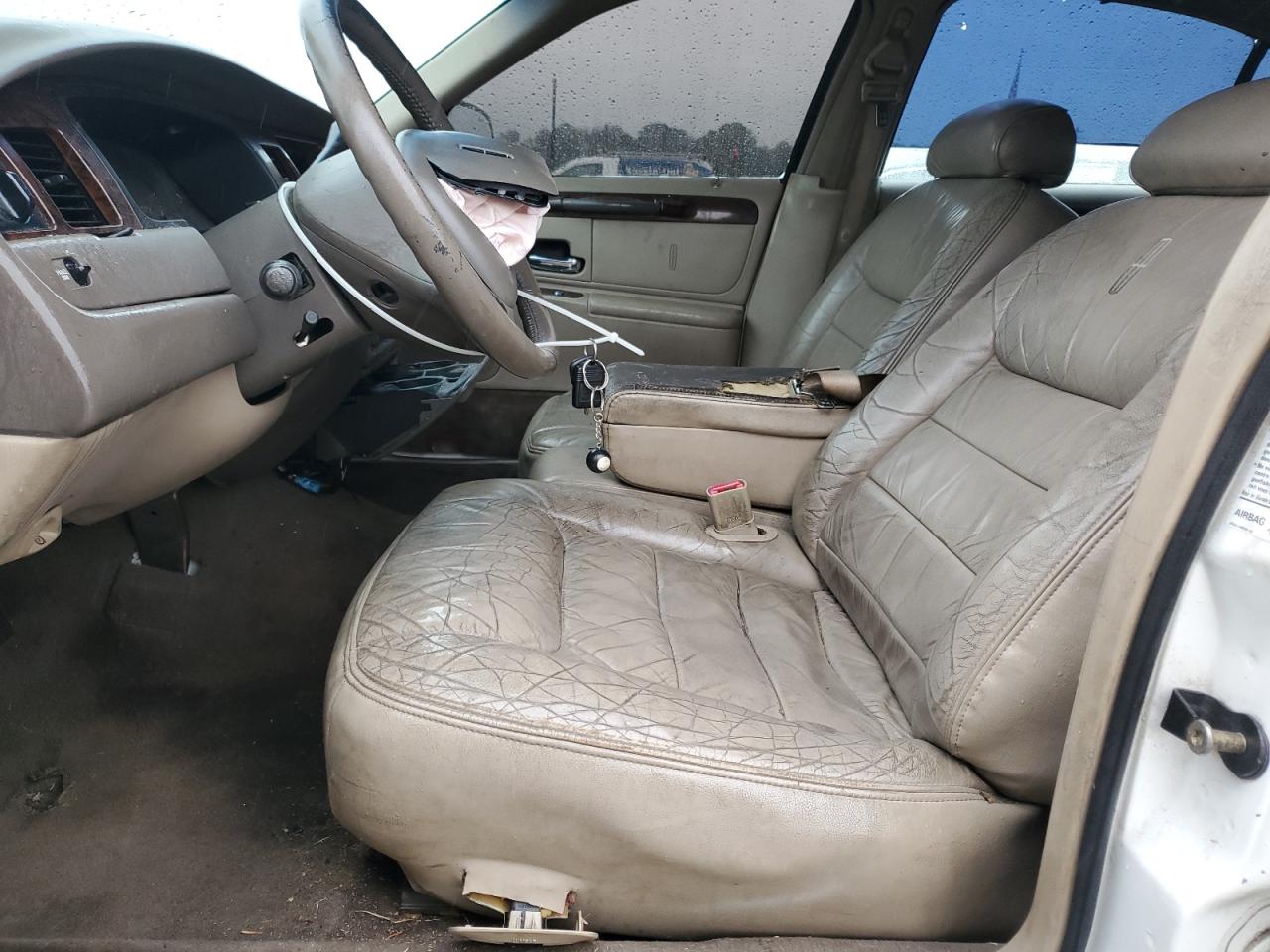 1999 Lincoln Town Car Signature VIN: 1LNHM82W2XY636529 Lot: 90594925