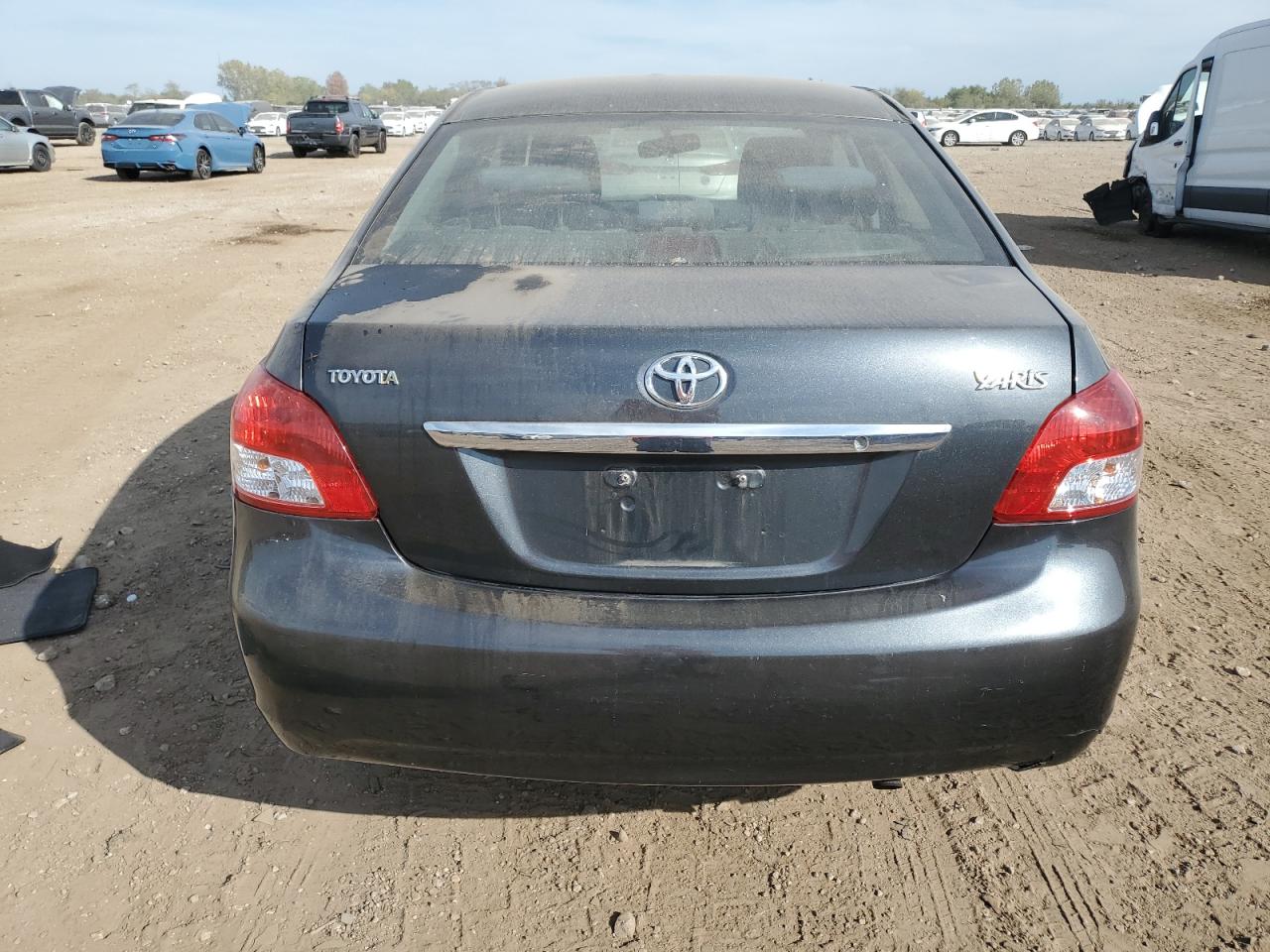 2009 Toyota Yaris VIN: JTDBT903291307658 Lot: 81899975