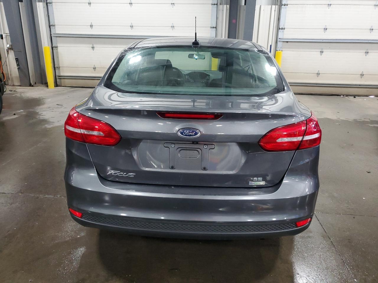 2018 Ford Focus Se VIN: 1FADP3FE9JL230353 Lot: 85586885
