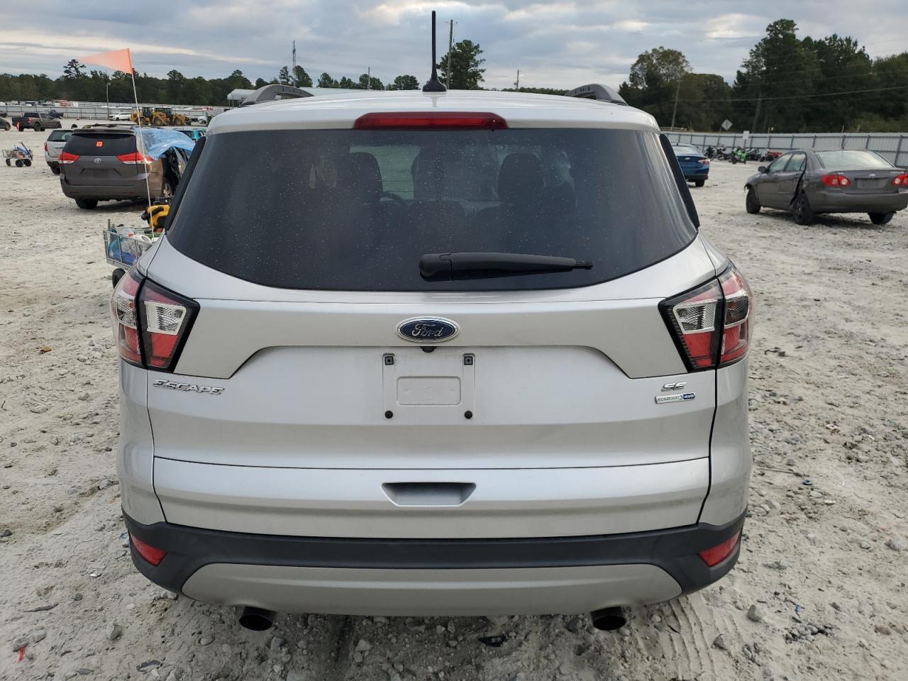 2018 Ford Escape Se VIN: 1FMCU9GD9JUA27475 Lot: 82301455