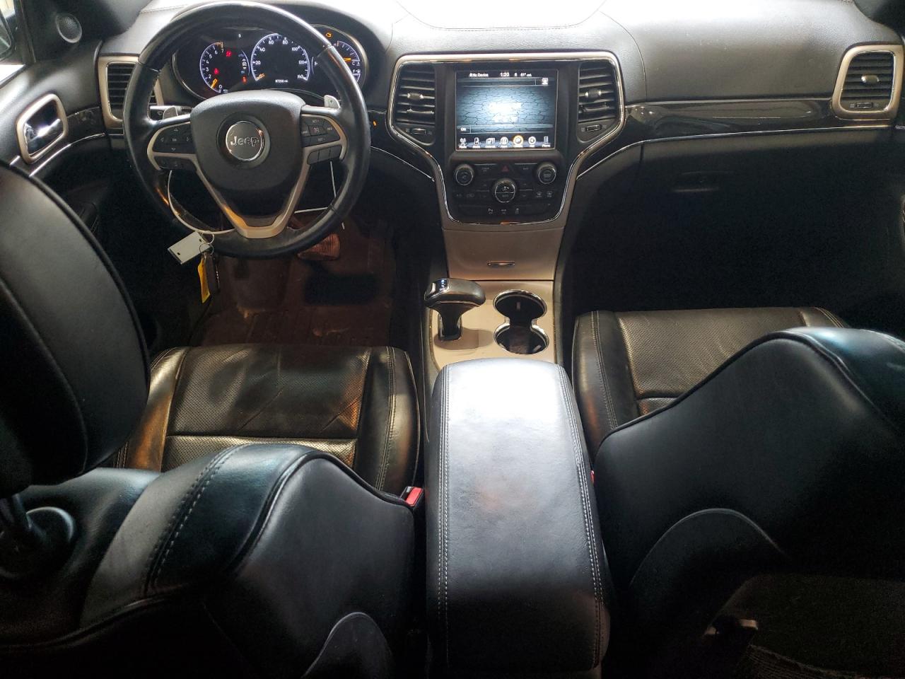 2015 Jeep Grand Cherokee Overland VIN: 1C4RJFCGXFC877599 Lot: 82388315