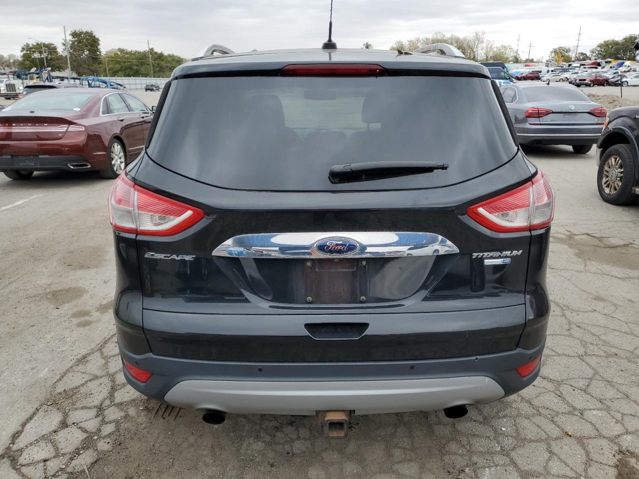 2014 Ford Escape Titanium VIN: 1FMCU9J9XEUC84185 Lot: 82599625