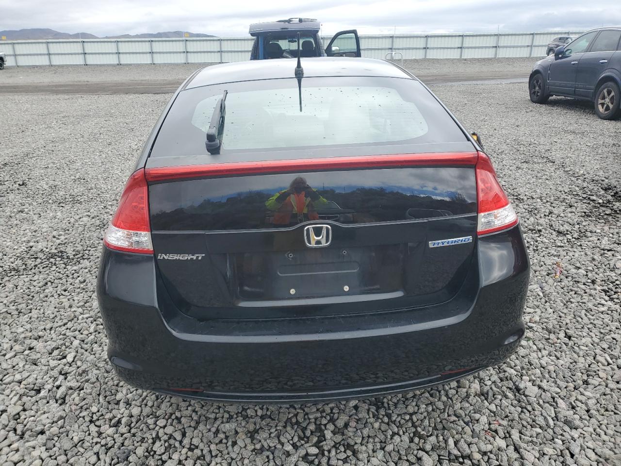 2010 Honda Insight Ex VIN: JHMZE2H72AS030076 Lot: 82490265