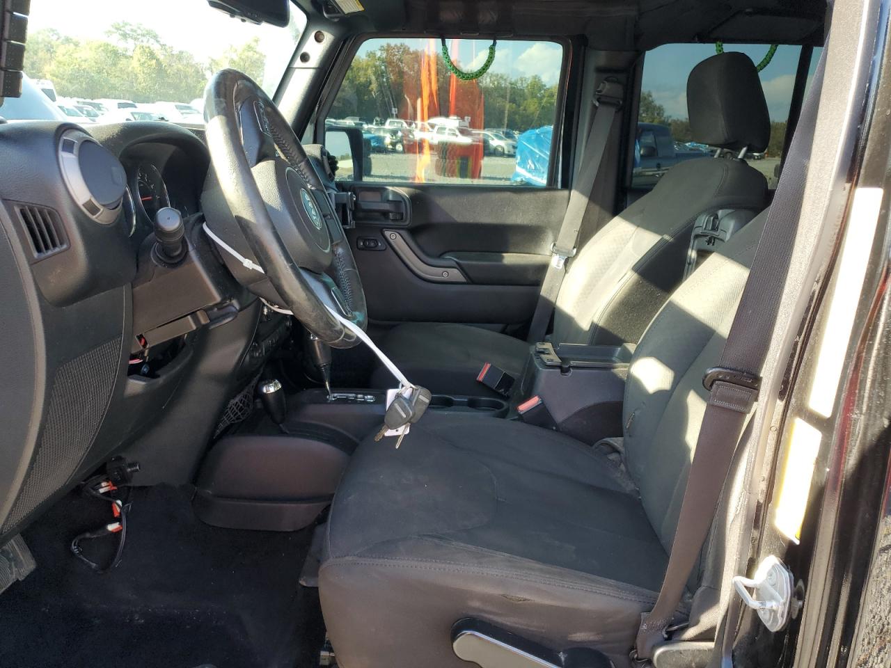 2015 Jeep Wrangler Unlimited Sport VIN: 1C4BJWDG9FL771032 Lot: 85364425