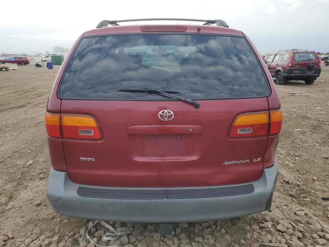 2000 Toyota Sienna Le VIN: 4T3ZF13C4YU280529 Lot: 82532555