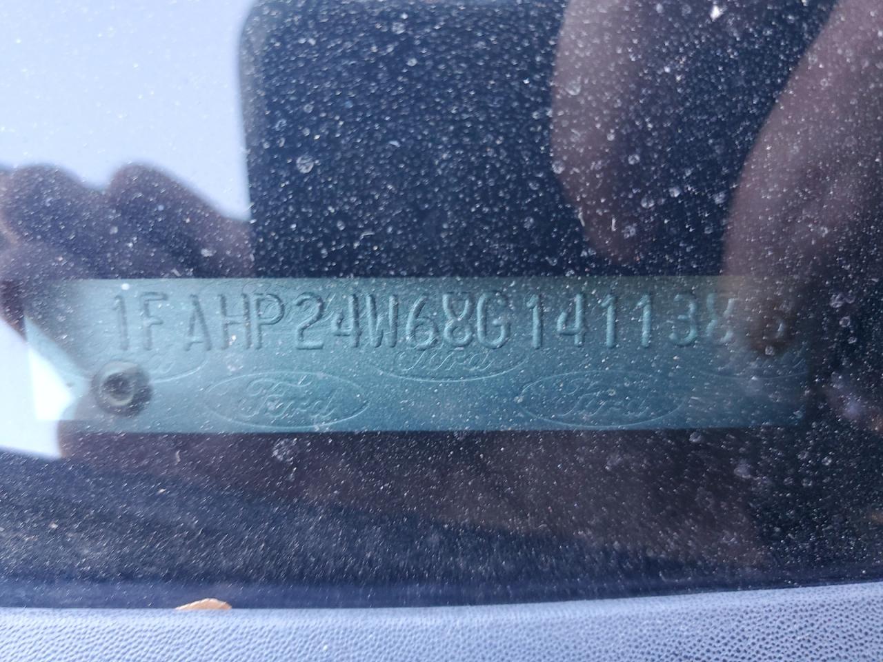 2008 Ford Taurus VIN: 1FAHP24W68G141138 Lot: 82574675