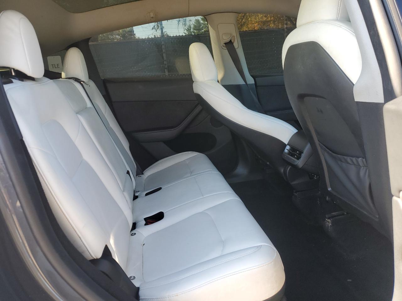 2023 Tesla Model Y VIN: 7SAYGDEE4PA213099 Lot: 86671035