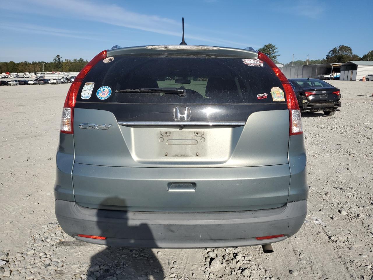 2012 Honda Cr-V Exl VIN: JHLRM3H72CC009657 Lot: 82765565