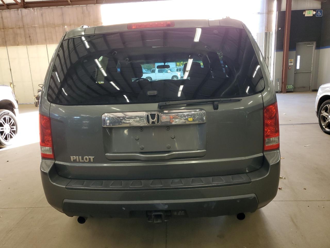 2009 Honda Pilot Lx VIN: 5FNYF38219B009703 Lot: 86054625