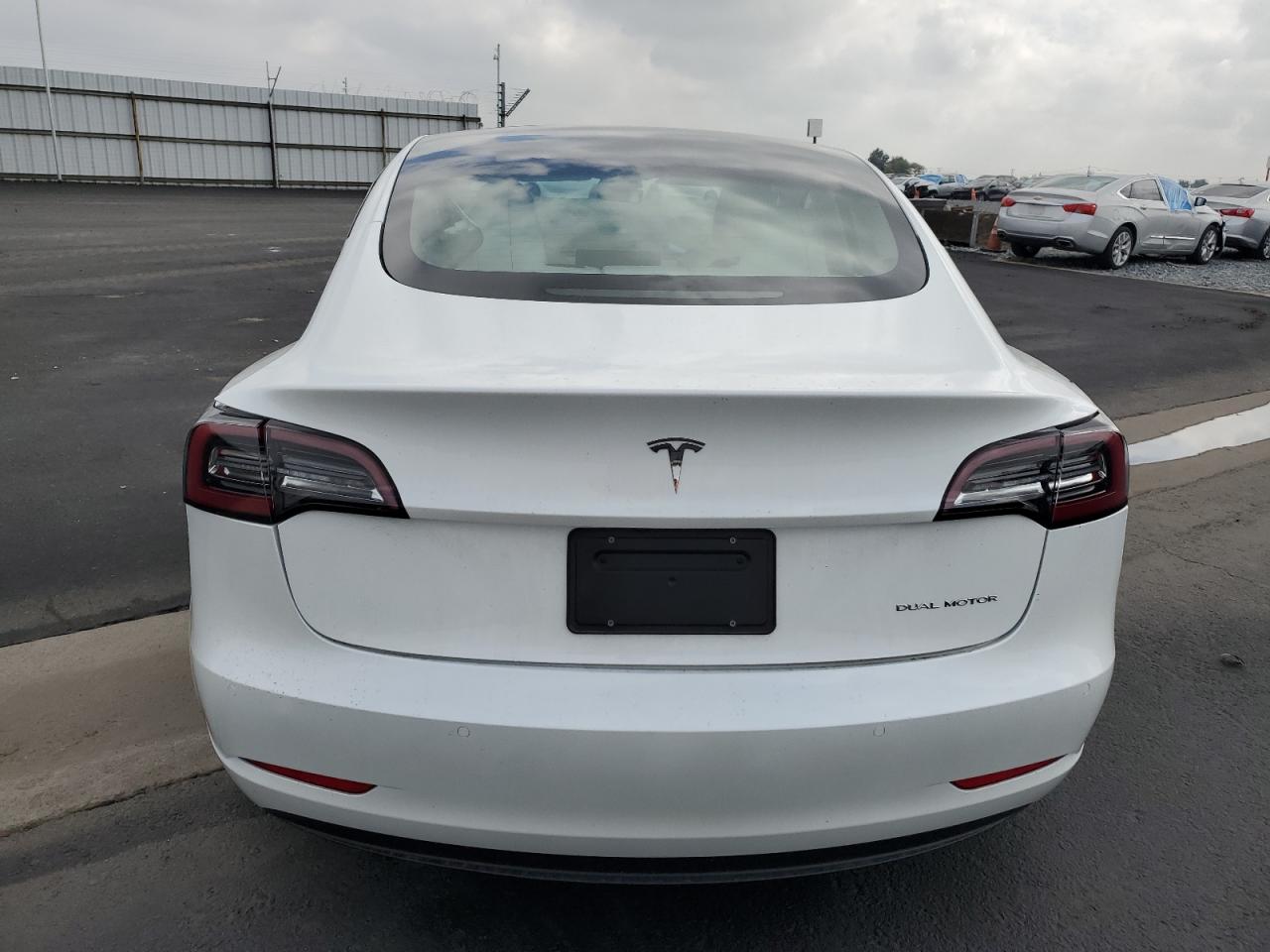 2021 Tesla Model 3 VIN: 5YJ3E1EB8MF999389 Lot: 89869385