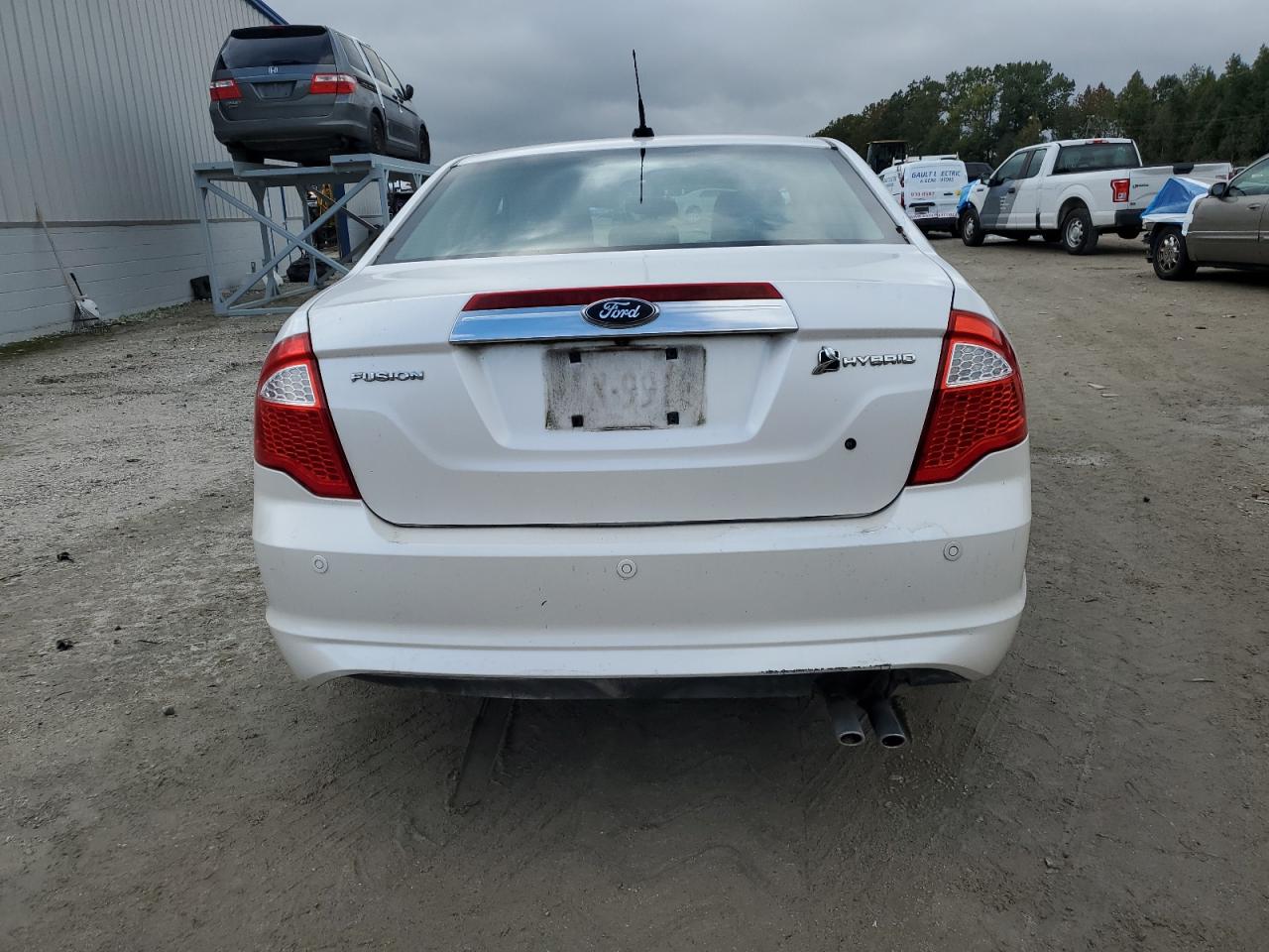 2010 Ford Fusion Hybrid VIN: 3FADP0L30AR117149 Lot: 86117225