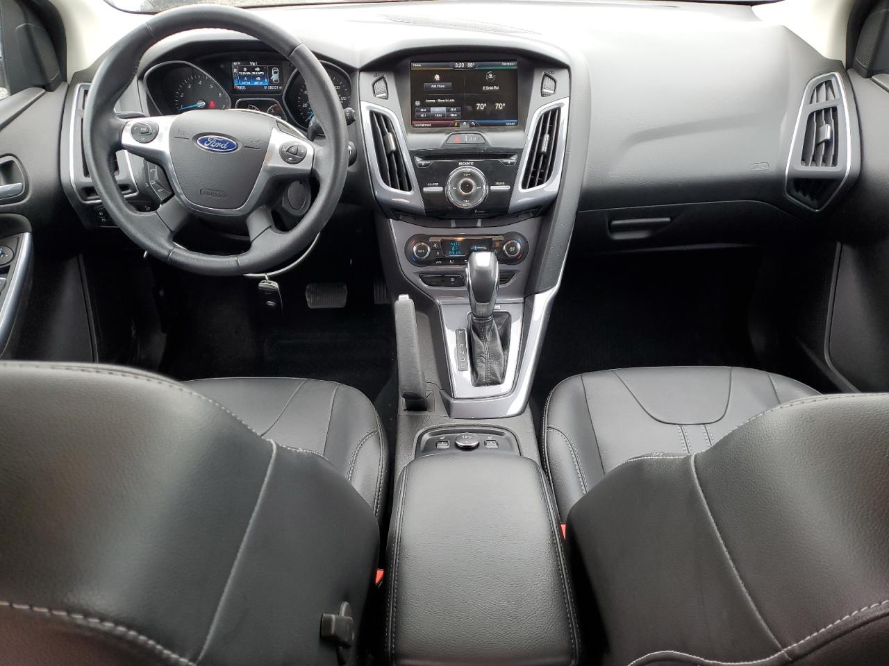 2014 Ford Focus Titanium VIN: 1FADP3N28EL211371 Lot: 82402975