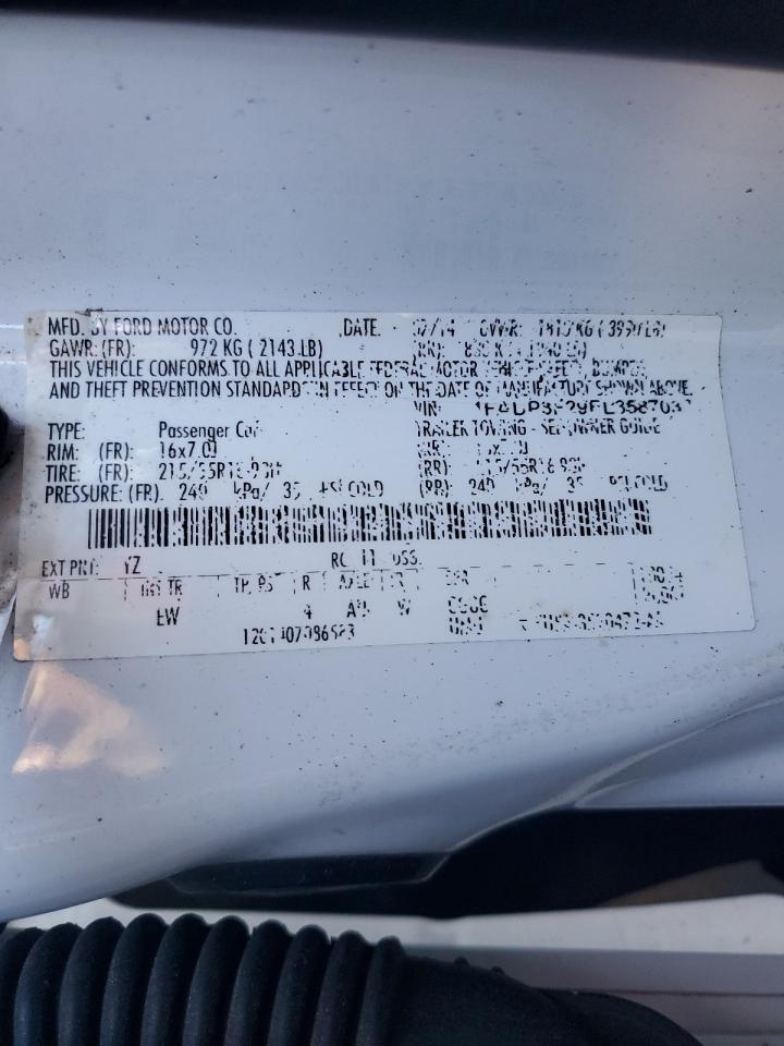 2014 Ford Focus Se VIN: 1FADP3F29EL358703 Lot: 84195605