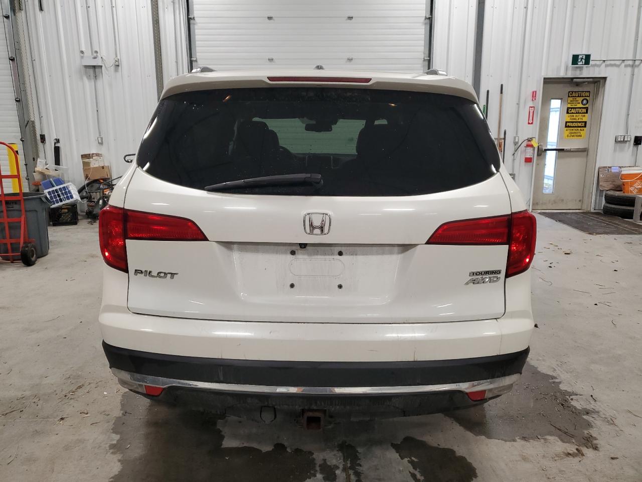 2018 Honda Pilot Touring VIN: 5FNYF6H90JB502503 Lot: 84008655