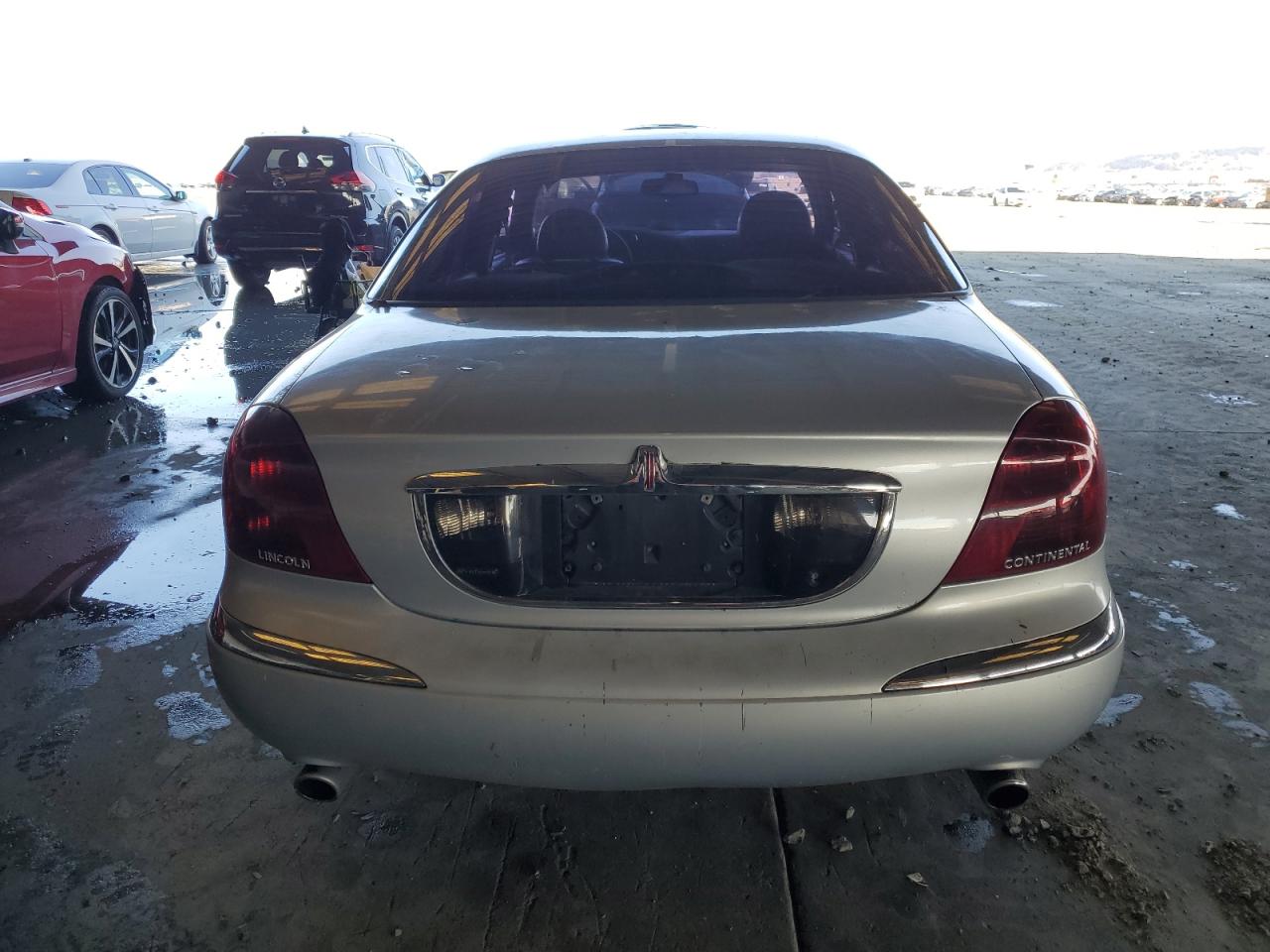 2000 Lincoln Continental VIN: 1LNHM97V9YY885613 Lot: 86547535
