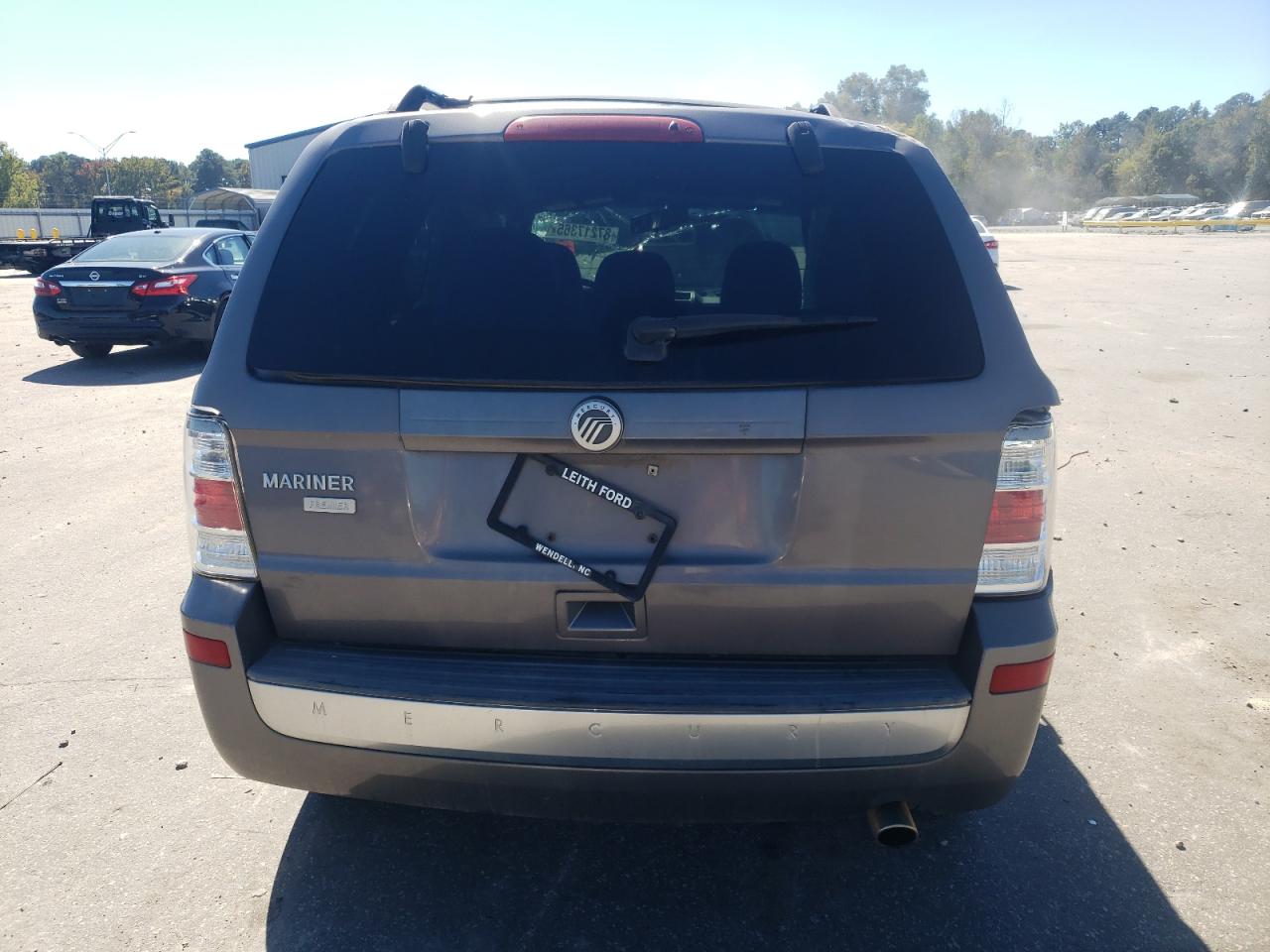 2010 Mercury Mariner Premier VIN: 4M2CN8H72AKJ19411 Lot: 87217365