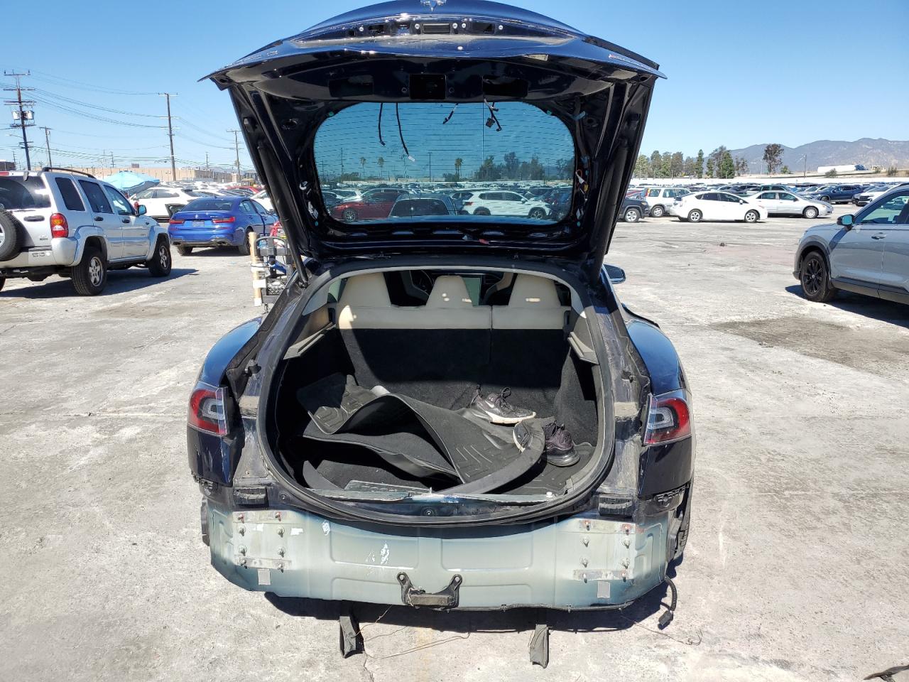 2014 Tesla Model S VIN: 5YJSA1H26EFP62758 Lot: 87243555