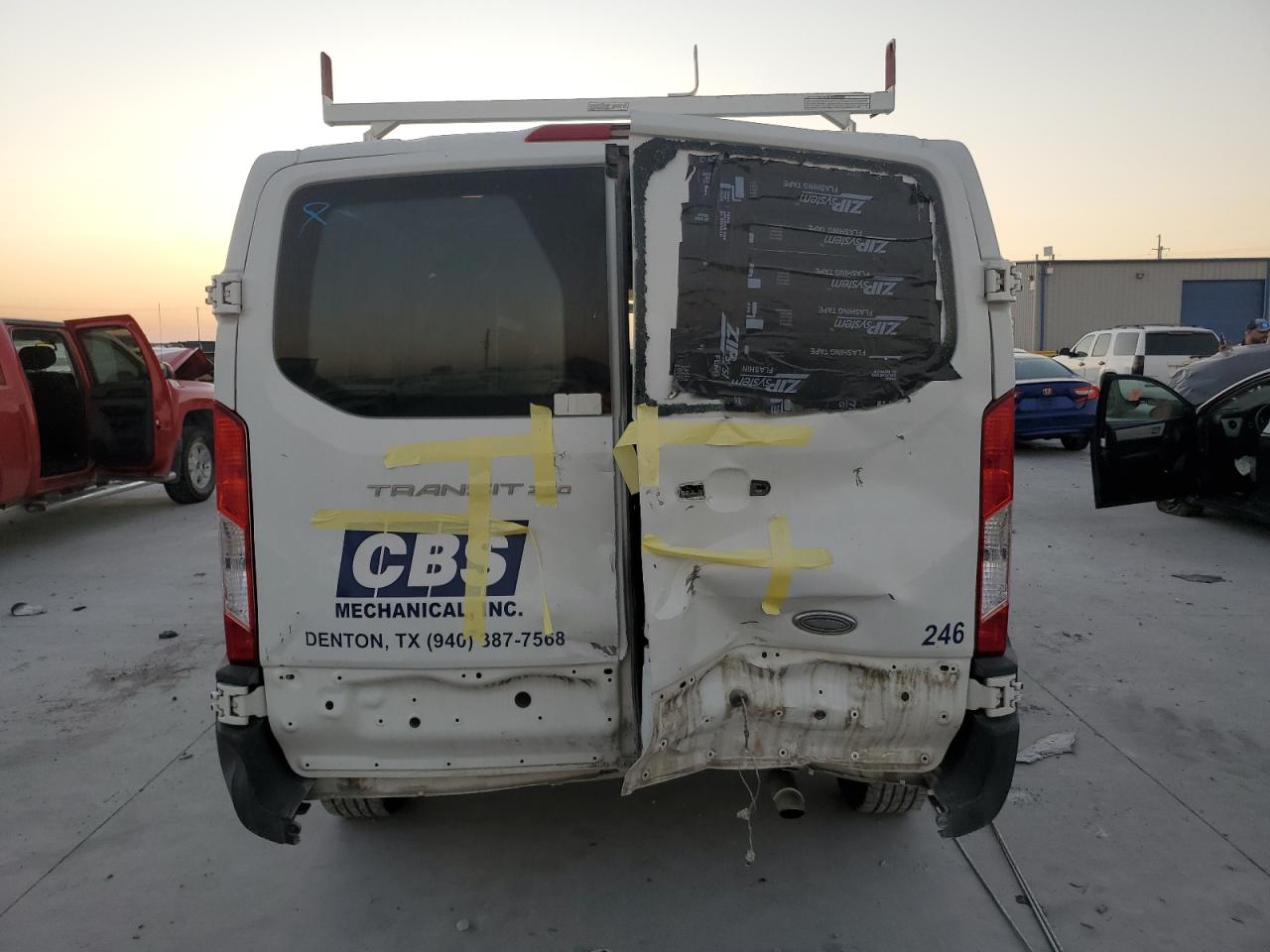 2015 Ford Transit Cargo Van T- VIN: 1FTNR1ZM0FKA35030 Lot: 82493025