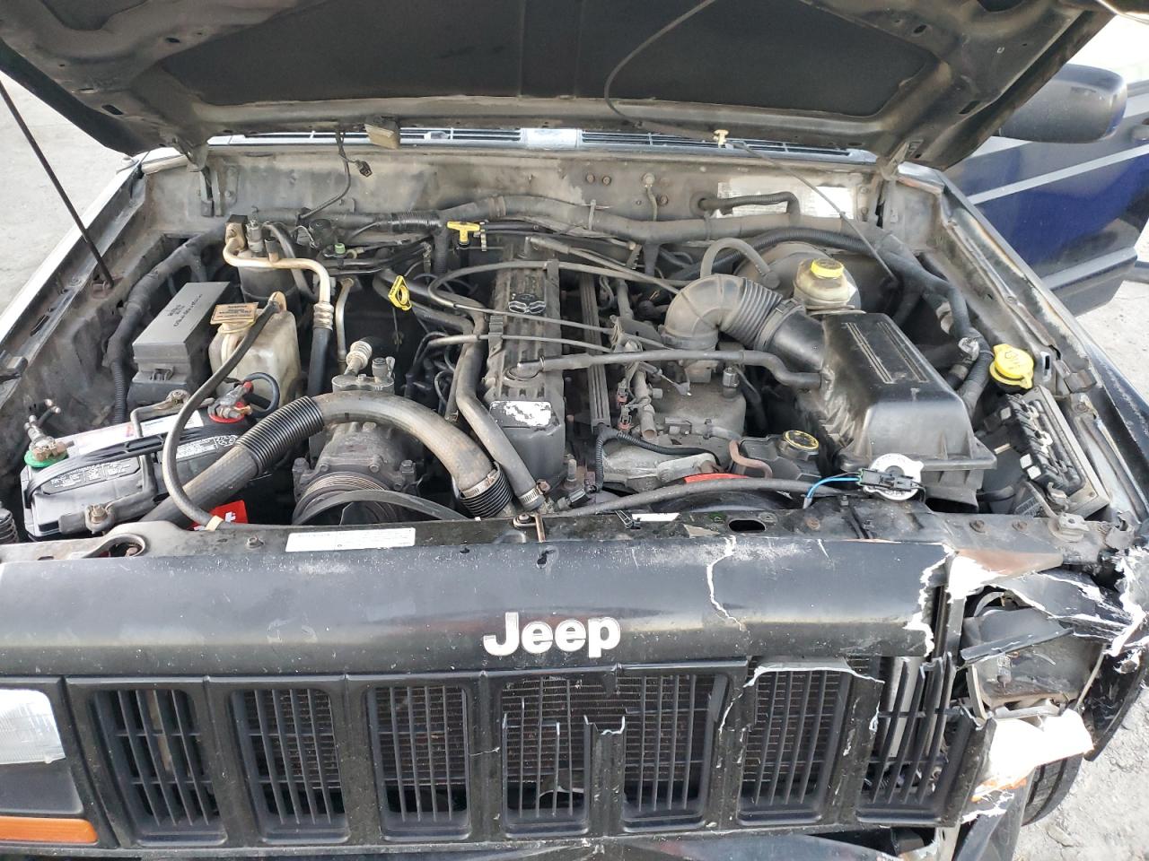 1999 Jeep Cherokee Sport VIN: 1J4FT68S2XL670579 Lot: 90354775