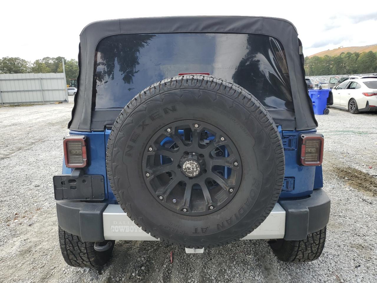 2009 Jeep Wrangler Unlimited Sahara VIN: 1J8GB59149L713277 Lot: 85342455
