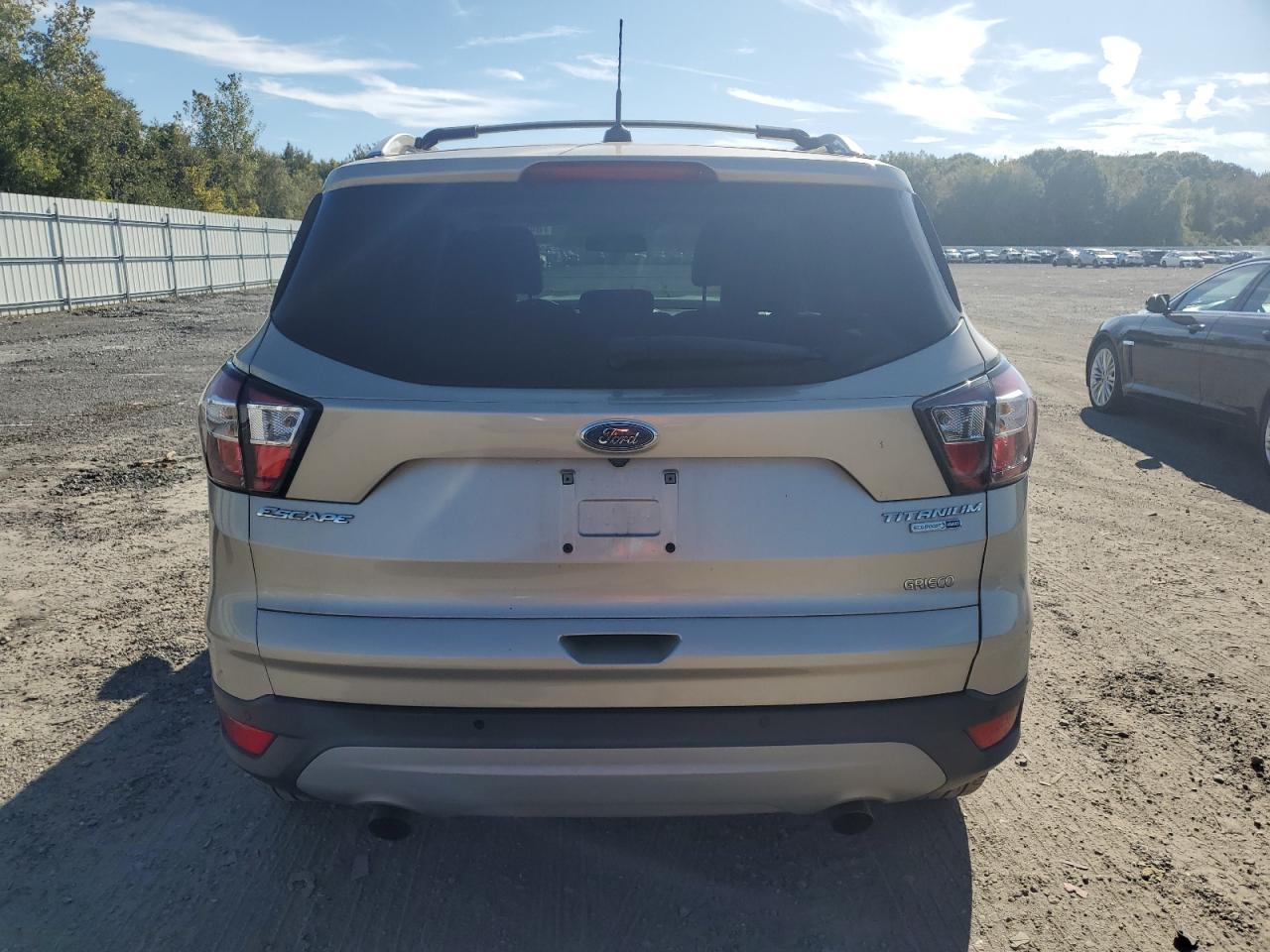 2017 Ford Escape Titanium VIN: 1FMCU9JD2HUB33446 Lot: 84588615