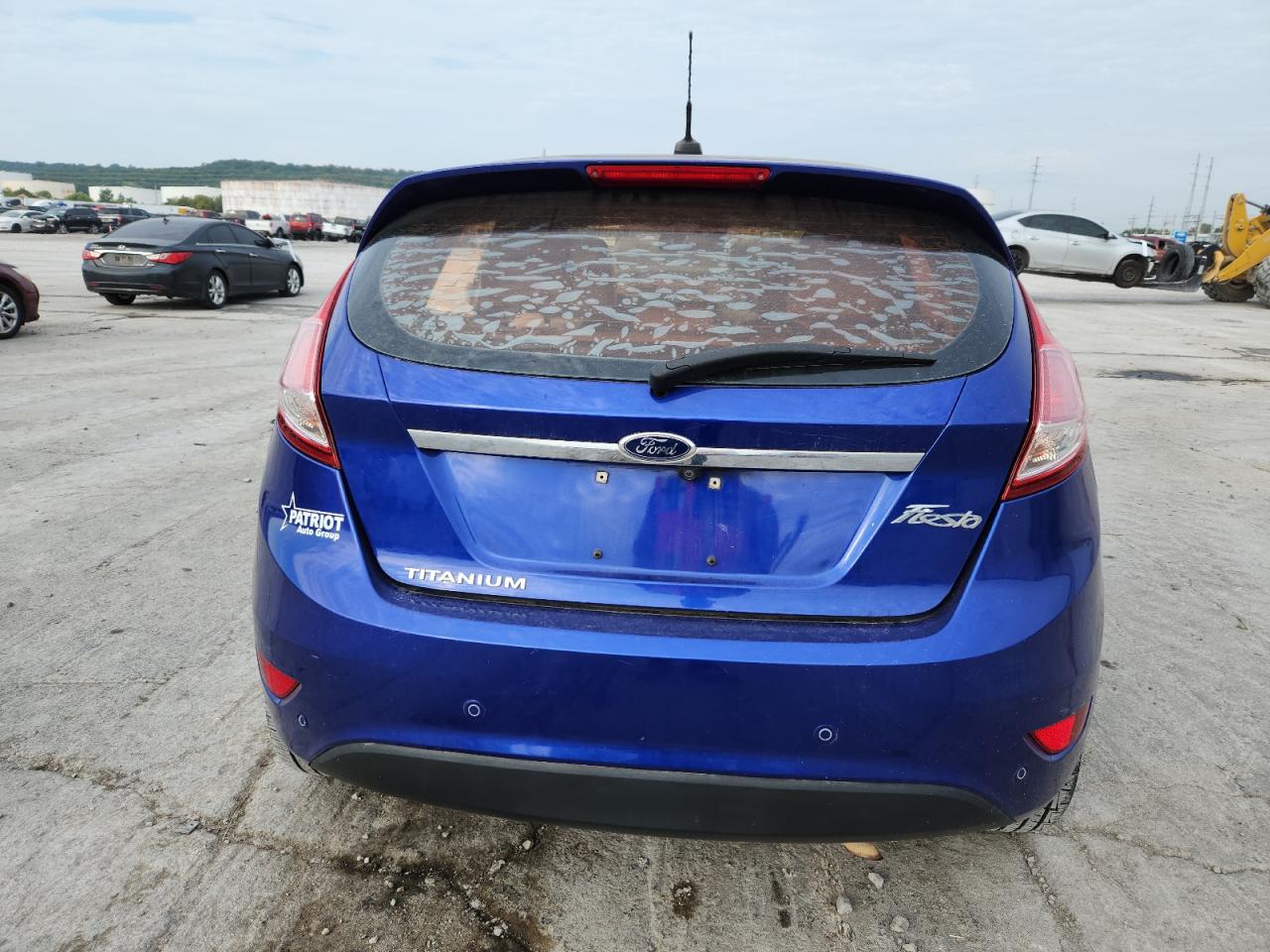 2014 Ford Fiesta Titanium VIN: 3FADP4FJ7EM125818 Lot: 82490415