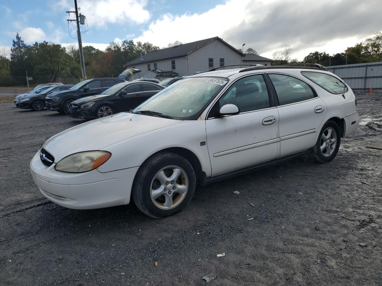FORD TAURUS 2001. Lot# 86487505. VIN 1FAFP58S31A242002. Photo 1