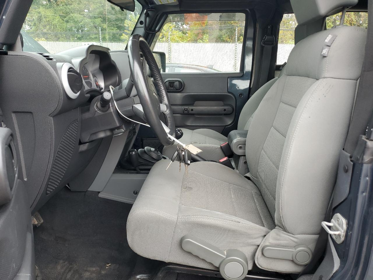 2008 Jeep Wrangler Sahara VIN: 1J8FA54128L521036 Lot: 86328185