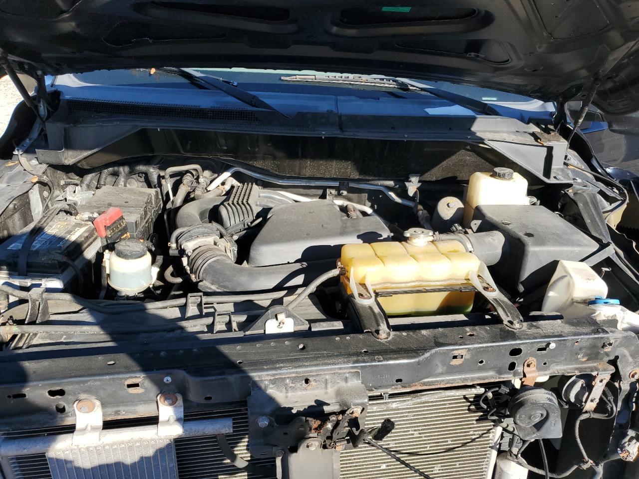 2014 Nissan Nv 1500 VIN: 1N6BF0KM9EN107594 Lot: 86148775