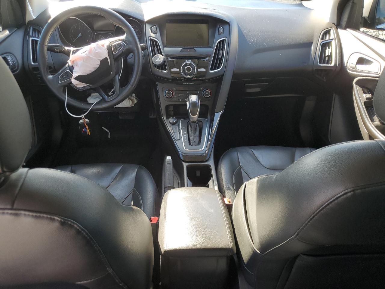 2017 Ford Focus Titanium VIN: 1FADP3N26HL320464 Lot: 82304745